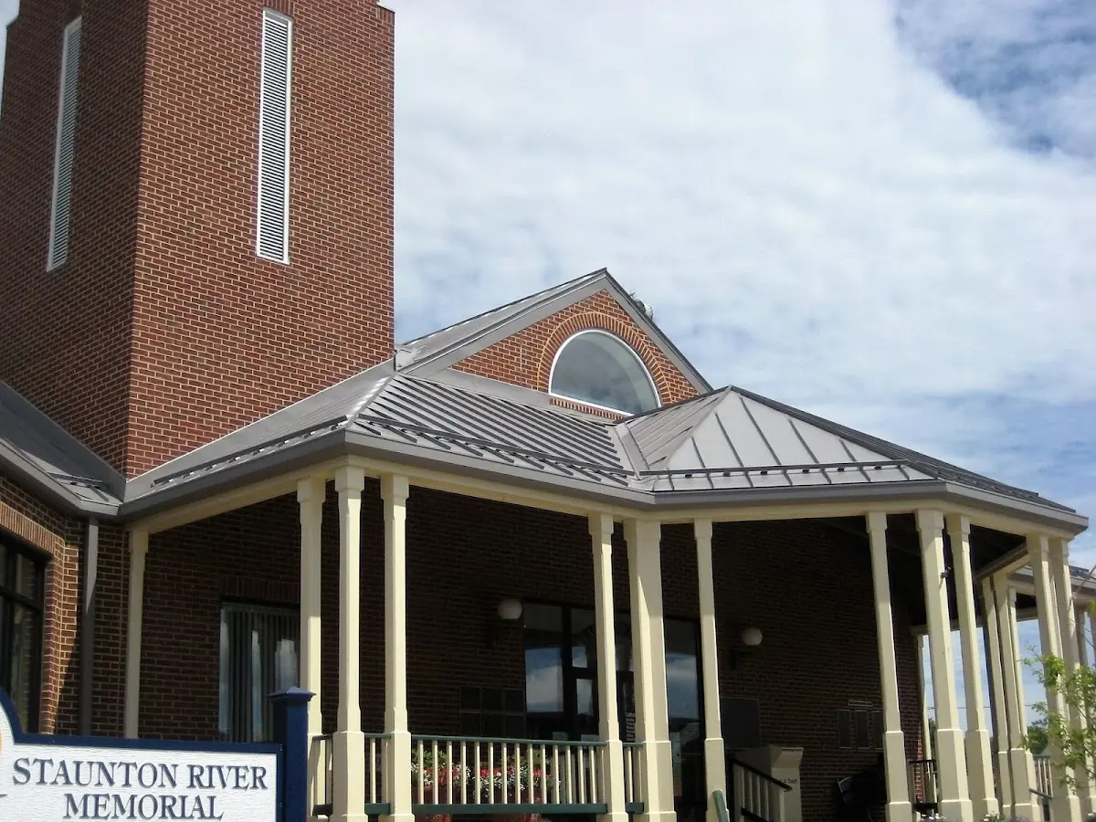 Skilled roofing craftsmen working on a residential roof in Converse